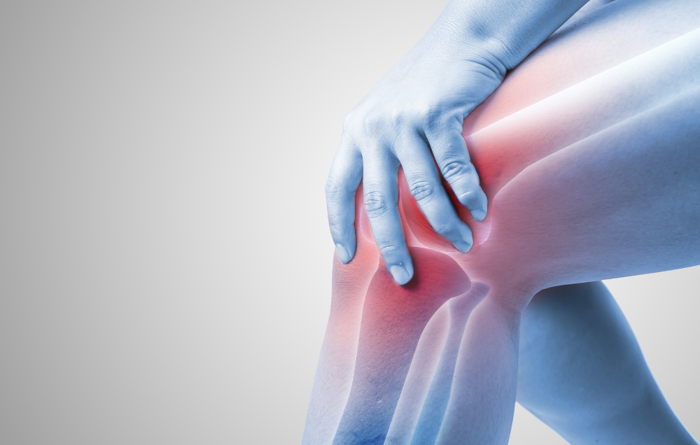 What causes pain behind the knee when walking?